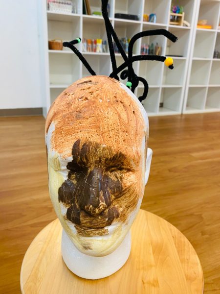 THREE-DIMENSIONAL HEADS THE HAIR STUDY | Chenille Stems and Styrofoam | Students studied hair and explored various hair styles, textures, and colors relating to culture and identity. This project invited students to celebrate diversity through open-ended art play.